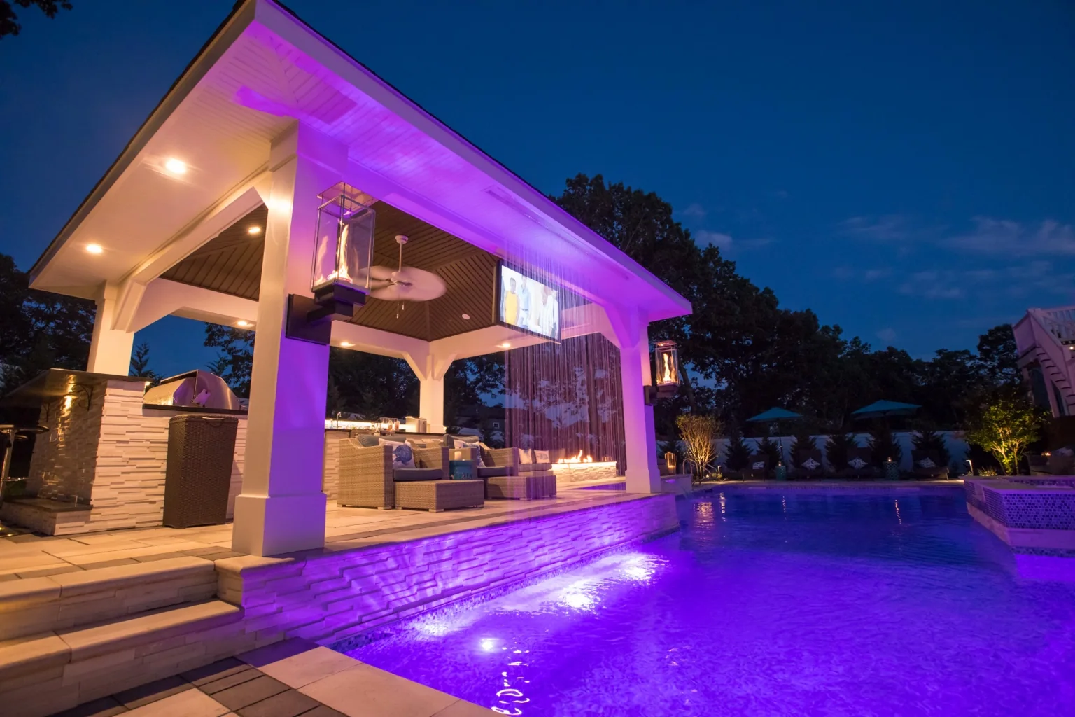 Brookhaven Long Island custom pavilion with rain curtain water feature beside swimming pool