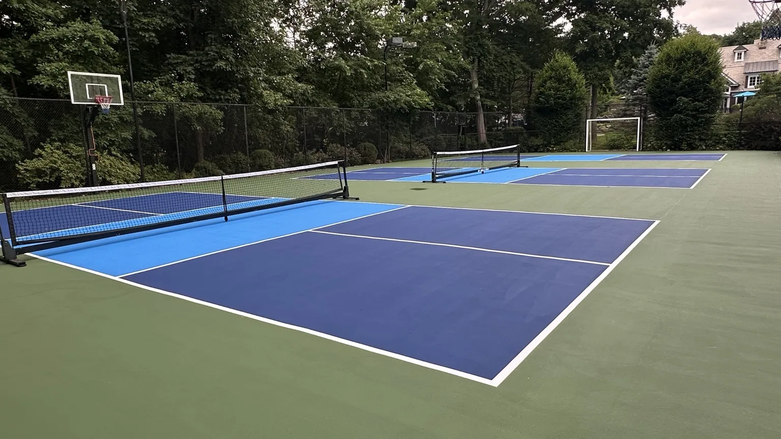 Three dedicated residential pickleball courts in Melville Long Island