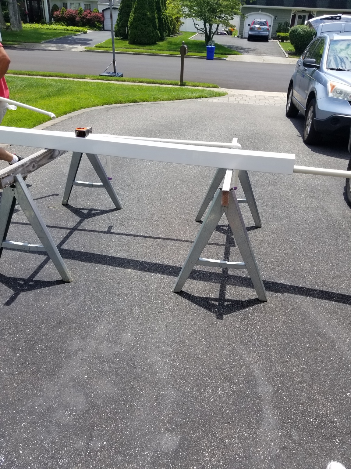 Off-site fabrication of custom rain curtain channel