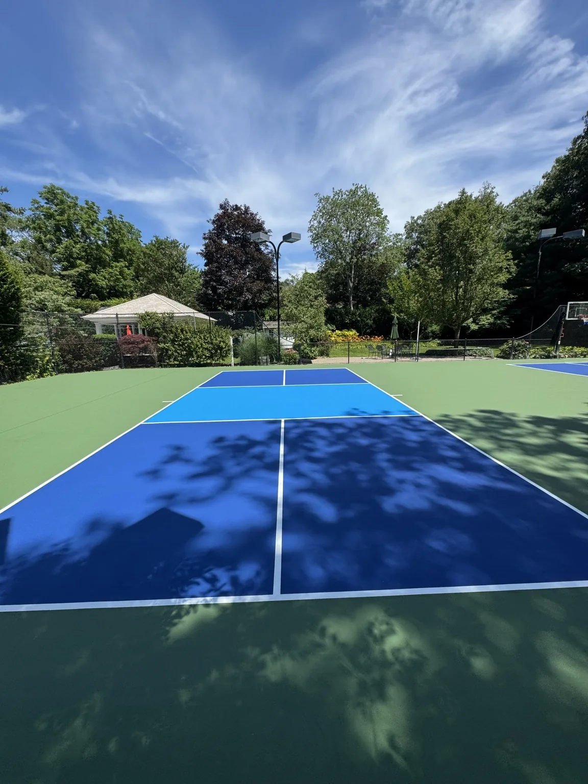 Dedicated blue green pickleball court in Melville New York
