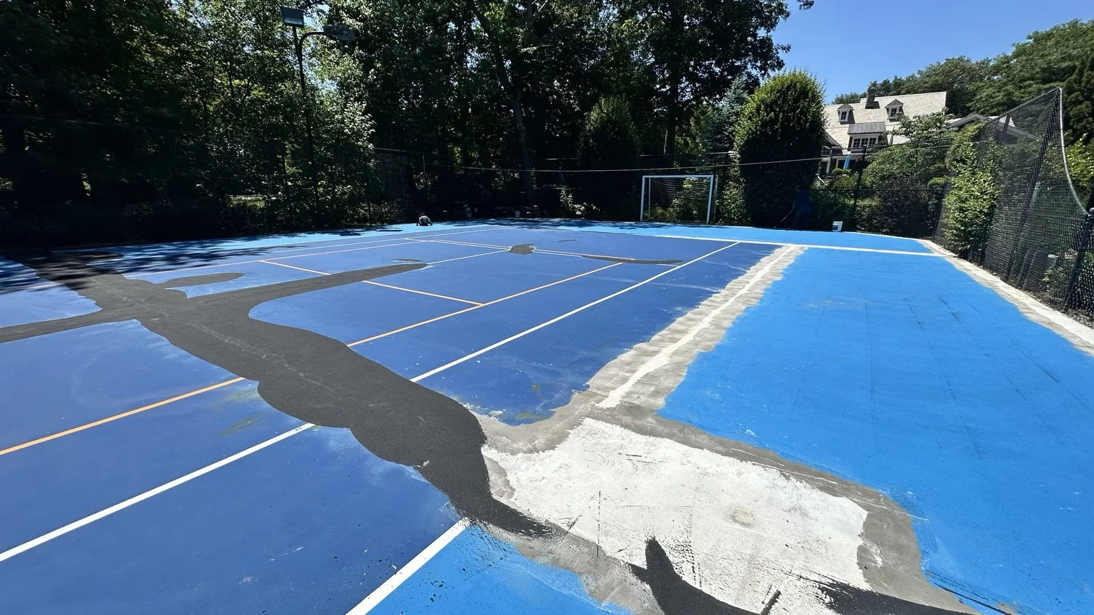Asphalt repair and patch work on Melville court