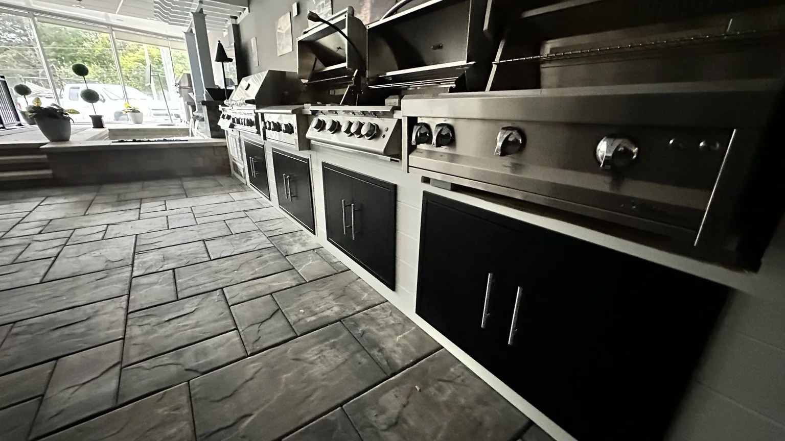 Premium outdoor grills and appliances displayed at L.I. Backyard Store in Melville