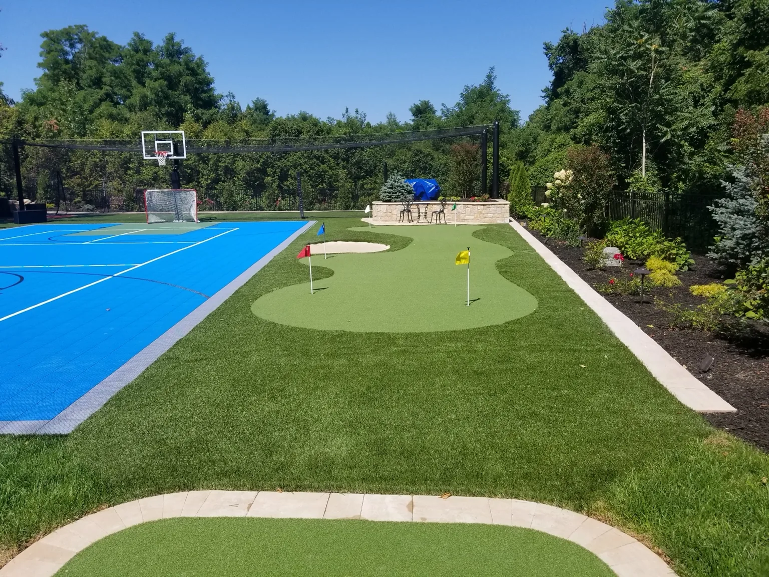 Synthetic turf putting green